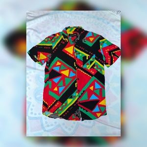 The brand is Reason. Perfect condition. Very colorful. Light and breathable.